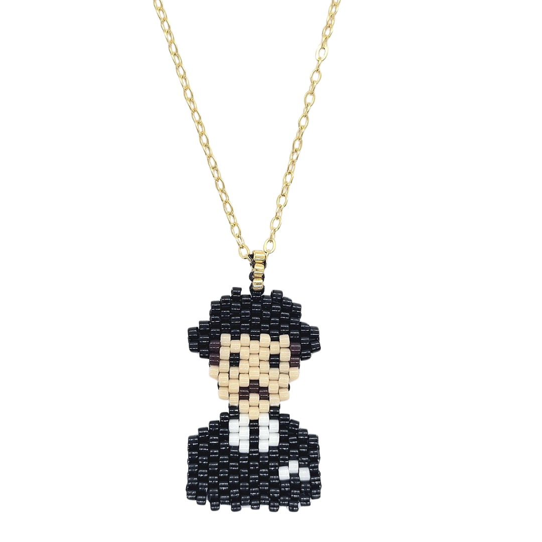 Collar Miyuki Dr. José Gregorio Hernandez Vestido de negro